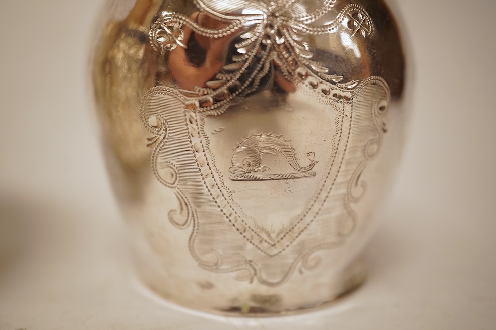 A George III silver helmet shaped cream jug, marks rubbed, 10cm(a.f.), together with a later Victorian silver sugar bowl and similar pierced silver mustard pot, no liner.